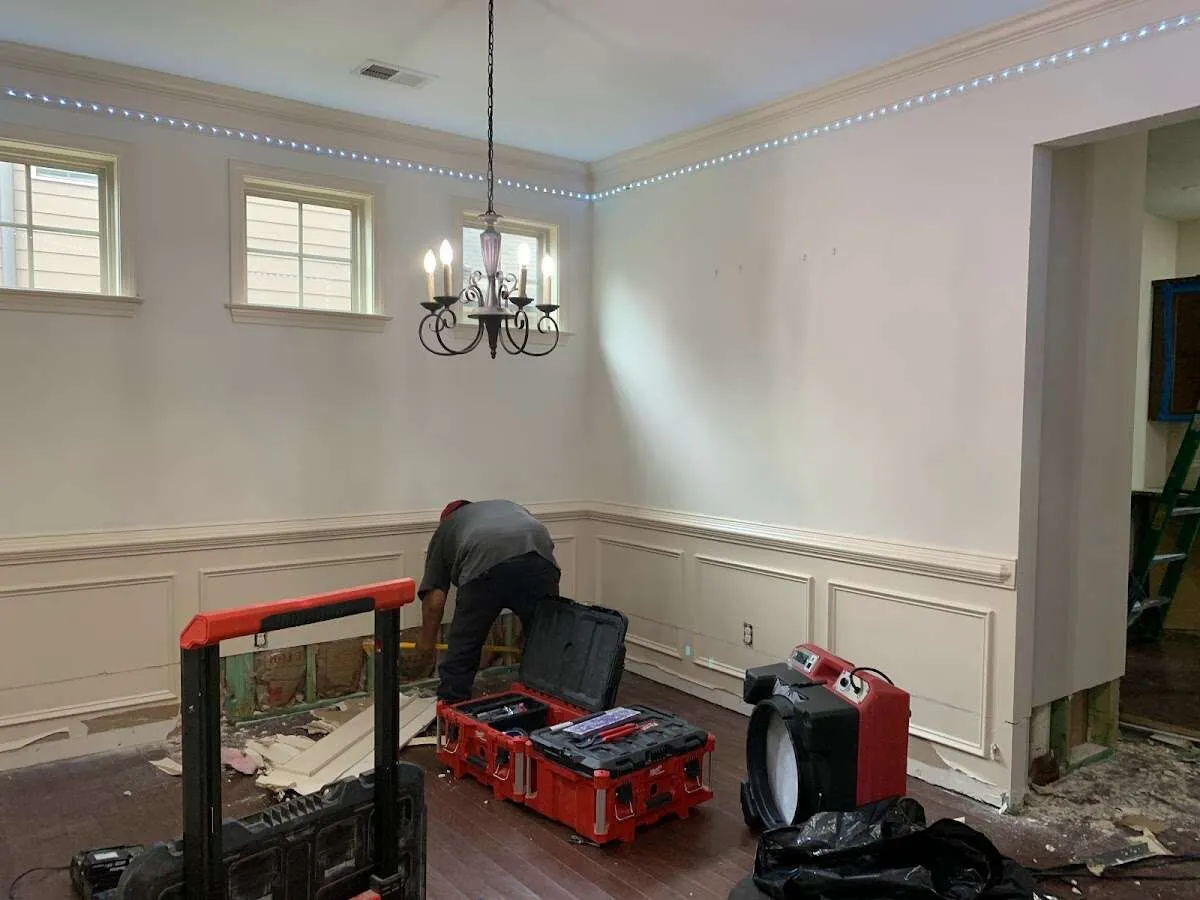 Restoration technician with professional equipment in Hanahan